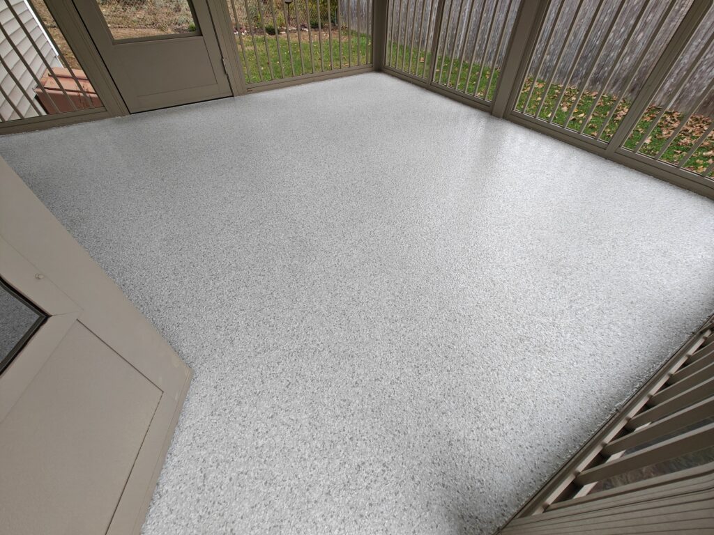 residential concrete coating Swan Flake over plywood base on this screened in porch in Southern Pines, NC-min